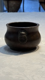 A Chinese bronze censer with lion-head handles and relief dragon design, Lu Gu Zhai 侶古齋 mark, 18/19th C.