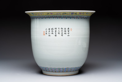A Chinese famille rose 'Mountainous Landscape' jardiniere with a stand and a pair of vases with floral design, Qianlong marks, 20th C.