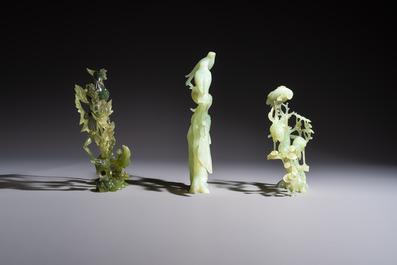Five Chinese hardstone carvings, four with wooden stands, 20th C.