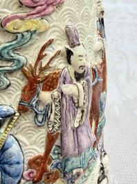 A pair of Chinese famille rose relief-moulded 'Immortals' vases, Qianlong mark, Republic