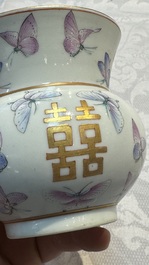 A Chinese famille rose 'Butterflies' spittoon, Tongzhi mark and of the period