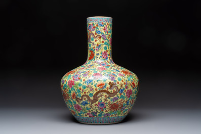 A Chinese famille rose yellow-ground 'Tianqiu Ping' vase with dragons and flowers, 20th C.