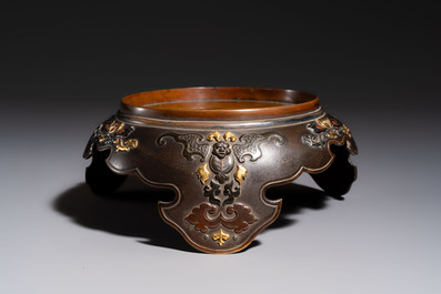 A fine Japanese bronze stand with silver-, gold- and copper-plated details, Meiji, 19th C.