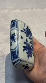 A Chinese blue and white betel nut box and cover with floral design, Wanli