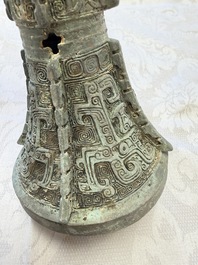 A Chinese archaic bronze wine vessel with Taotie design, Gu 觚, Shang