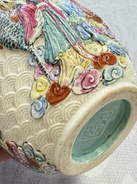 A pair of Chinese famille rose relief-moulded 'Immortals' vases, Qianlong mark, Republic