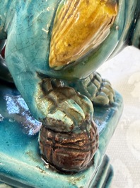 A pair of Chinese turquoise-glazed Buddhist lions, a pair of green-glazed parrots and a pair of miniature garden seats, 19/20th C.