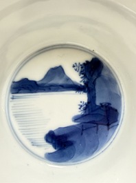 A Chinese blue and white 'Hunting Scene' cup and saucer, Kangxi