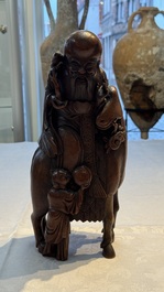 A large Chinese carved bamboo 'Shoulao' group, 19th C.