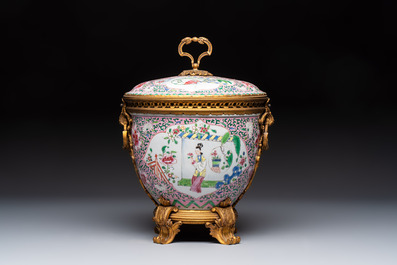 A gilt-bronze mounted famille rose-style covered bowl and two vases, one with cover, Samson, Paris, 19th C.
