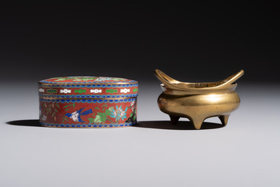 A group of eleven Chinese decorative objects, including bronze, cloisonn&eacute;, wood, and silk, 20th C.