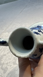 A Chinese blue and white 'Floral' ewer, Transitional period