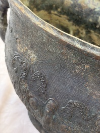 A rare and large Chinese archaistic bronze pouring vessel and cover, Gong 觥, Qing