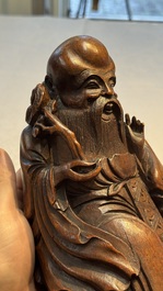 A large Chinese carved bamboo 'Shoulao' group, 19th C.