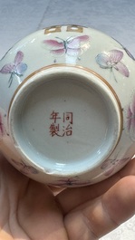 A Chinese famille rose 'Butterflies' spittoon, Tongzhi mark and of the period