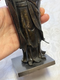 A Chinese bronze standing Guanyin with boy, Ming