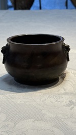 A Chinese bronze censer with lion-head handles and relief dragon design, Lu Gu Zhai 侶古齋 mark, 18/19th C.