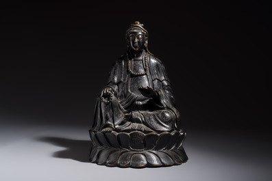 A Chinese bronze Bodhisattva seated on a lotus throne, 20th C.