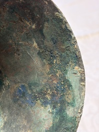 A Chinese archaic bronze wine vessel with Taotie design, Gu 觚, Shang