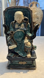 A Chinese fahua-glazed biscuit figure of Zhenwu, Ming
