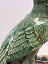 A pair of Chinese turquoise-glazed Buddhist lions, a pair of green-glazed parrots and a pair of miniature garden seats, 19/20th C.