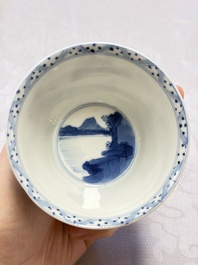 A Chinese blue and white 'Hunting Scene' cup and saucer, Kangxi