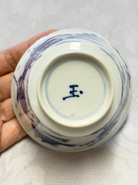 A Chinese blue and white 'Hunting Scene' cup and saucer, Kangxi