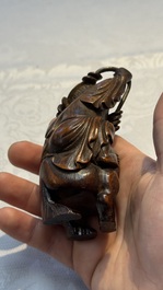 A small Chinese carved bamboo group of 'Liuhai', 19th C.