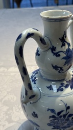 A Chinese blue and white 'Floral' ewer, Transitional period