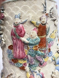 A pair of Chinese famille rose relief-moulded 'Immortals' vases, Qianlong mark, Republic