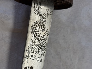 A Chinese palace guard sword 'Dao' inscribed 'Da Nei Shi Wei 大內侍衛', with lacquered wooden scabbard and gilt-bronze 'Dragon' mounts, Qing