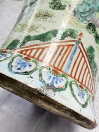 A pair of Chinese famille rose '18 Luohan' vases and covers, 19th C.
