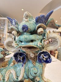 A pair of large Chinese polychrome-glazed Shiwan stoneware Buddhist lions, 19th C.