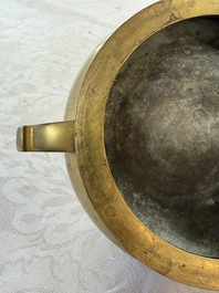 A fine Chinese bronze tripod censer and stand, Xuande mark, 17/18th C.