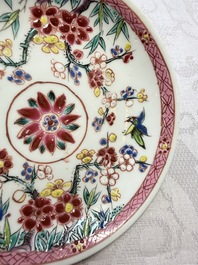 Three Chinese famille rose 'Birds and Plum Trees' cups and saucers, Yongzheng