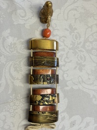 A fine Japanese four-case metal-inlaid lacquer 'Kanshin' inrō by Kōzan with a red coral ojime and a 'Jurojin' netsuke, Kōzan 光山 mark, Edo