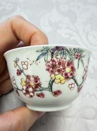 Three Chinese famille rose 'Birds and Plum Trees' cups and saucers, Yongzheng