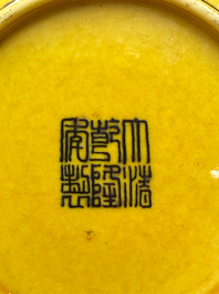 A small Chinese yellow-ground aubergine and green enamelled dragon plate, Qianlong mark, 19/20th C.