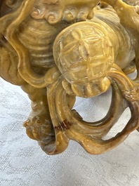 A fine Chinese soapstone group of Buddhist lions on wooden stand, 19th C.