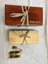 A fine Japanese four-case metal-inlaid lacquer 'Kanshin' inrō by Kōzan with a red coral ojime and a 'Jurojin' netsuke, Kōzan 光山 mark, Edo