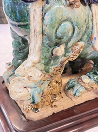 A pair of large Chinese polychrome-glazed Shiwan stoneware Buddhist lions, 19th C.