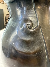 An unusual Chinese zoomorphic 'Mythical Beast' bronze vase, Kangxi