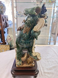 A pair of large Chinese polychrome-glazed Shiwan stoneware Buddhist lions, 19th C.