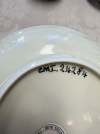 A pair of Chinese blue and white 'Ca Mau' shipwreck cups and saucers, Yongzheng