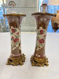 A pair of gilt-bronze-mounted Chinese famille rose capucine-ground vases and a covered bowl, Qianlong