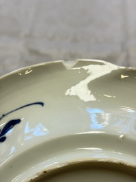 Eleven Chinese blue and white gadrooned 'Flowers and Peacocks' plates, Kangxi