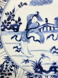 A pair of Chinese blue and white moulded dishes with dancing ladies, Kangxi
