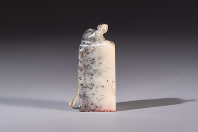 A Chinese soapstone seal with a carved mythical animal, inscribed Ying Hua Hong Bai Shang 樱花红陌上, 19/20th C.