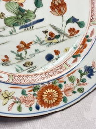 Three Chinese famille verte plates with floral design, one powder-blue-ground, Kangxi