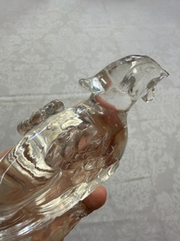 Three Chinese rock crystal sculptures on wooden stands, Republic